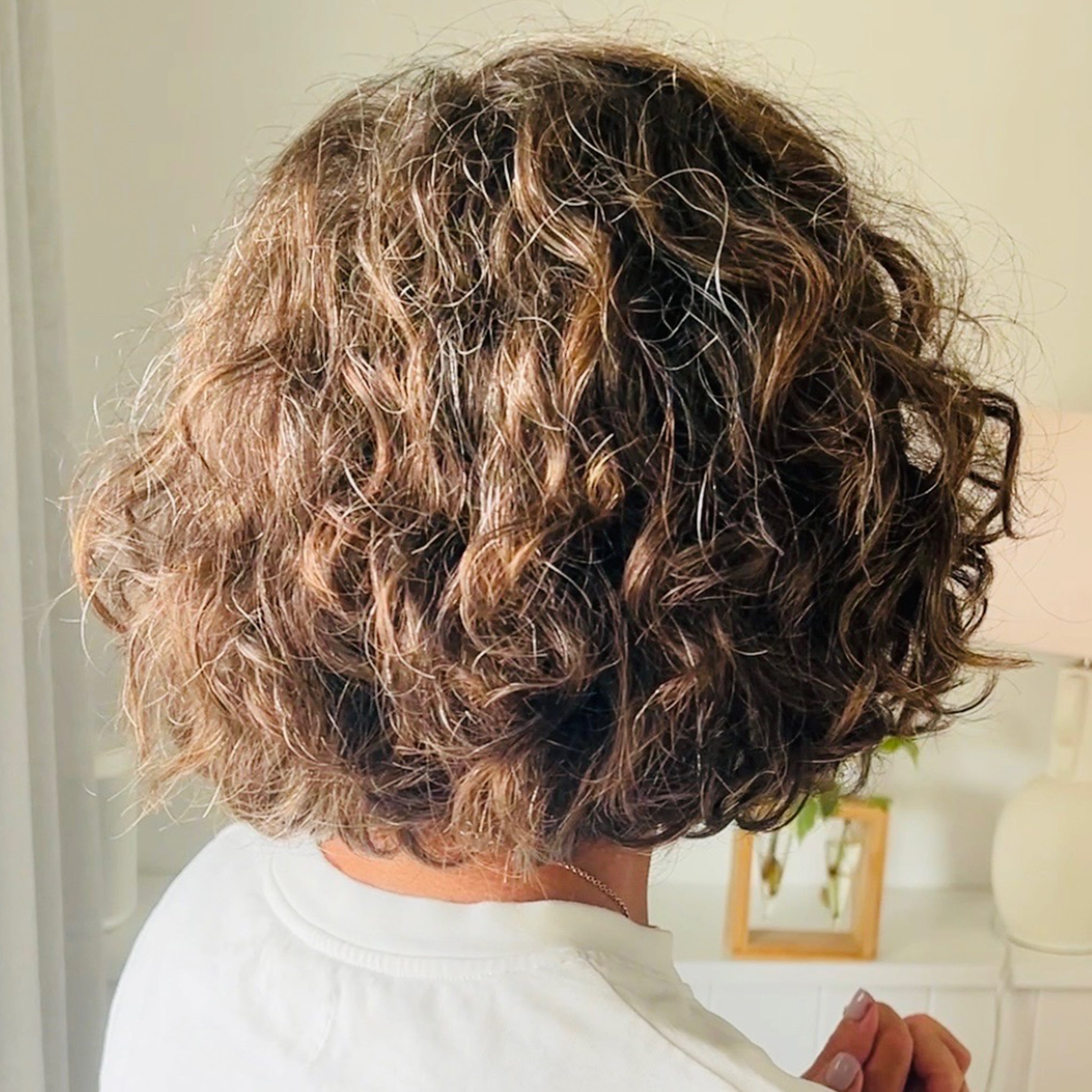 Amy use the Crown Curly Clean & Shine Bundle