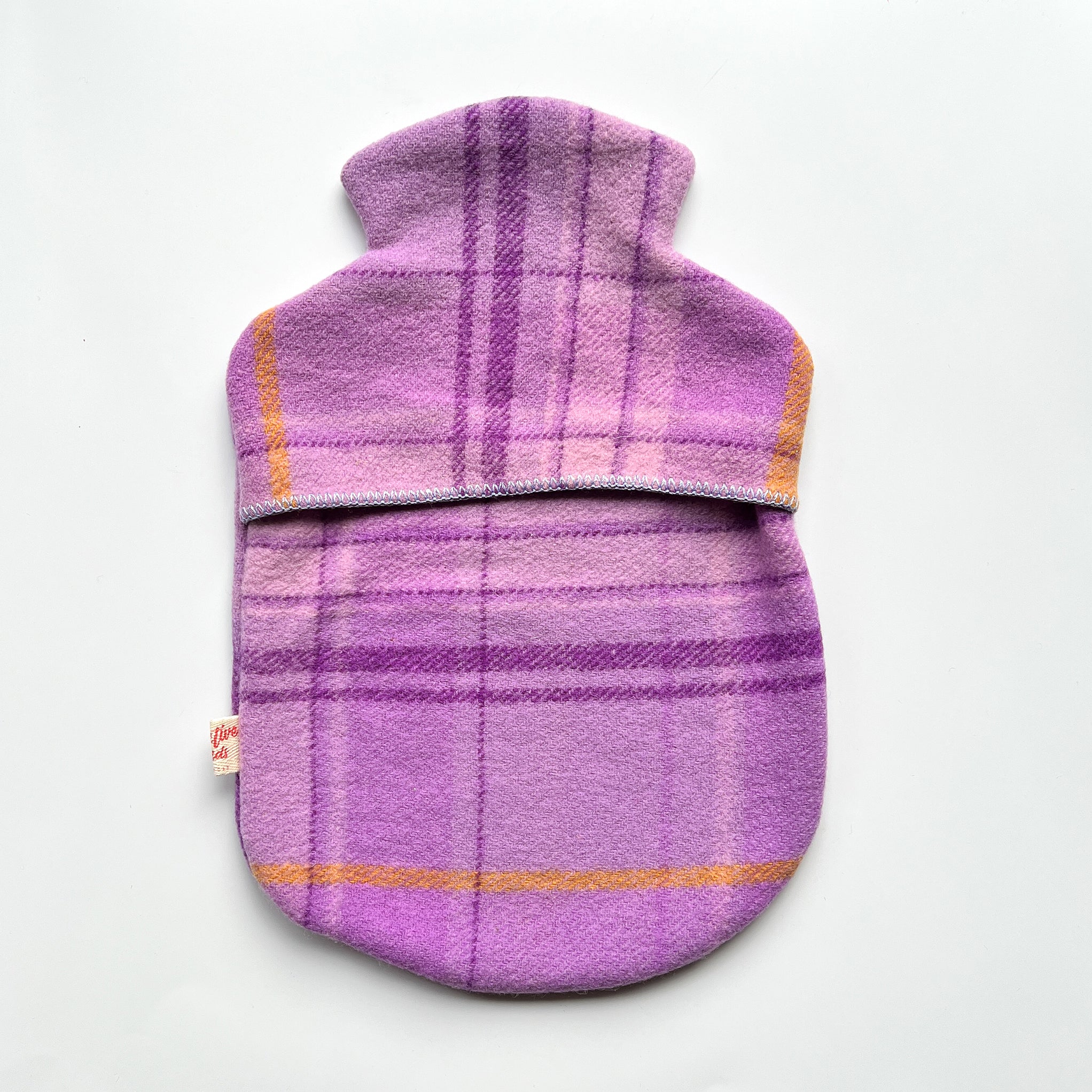 Purple woollen hot water bottle cover